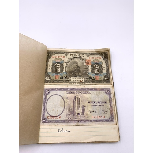 2266A - A mid 20th century banknote album containing Prisoners of War Camps one and five shillings confineme... 