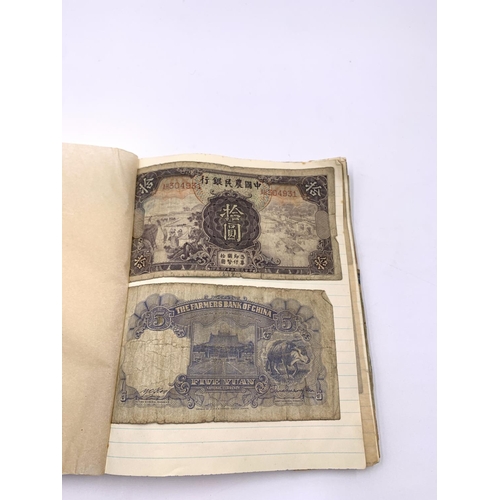 2266A - A mid 20th century banknote album containing Prisoners of War Camps one and five shillings confineme... 