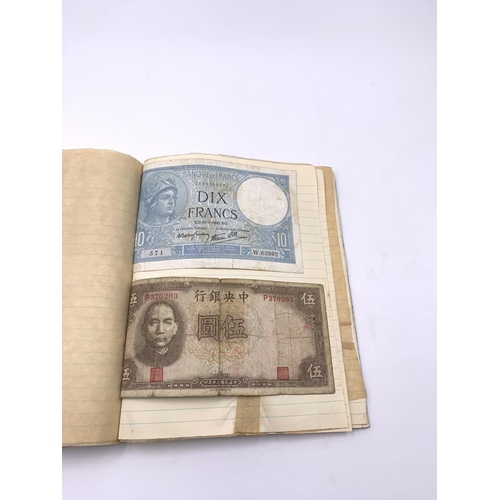 2266A - A mid 20th century banknote album containing Prisoners of War Camps one and five shillings confineme... 