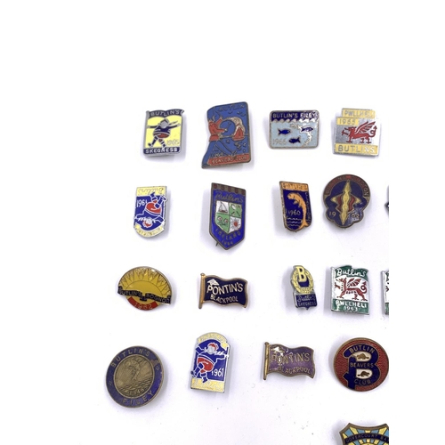 2268 - A collection of mid 20th century Butlins and Pontin's enamel badges