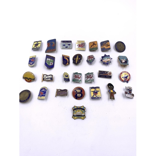 2268 - A collection of mid 20th century Butlins and Pontin's enamel badges