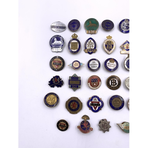 2269 - A collection of vintage enamel badges to include Yorkshire War Worker, Derbyshire Air Raid Welfare, ... 