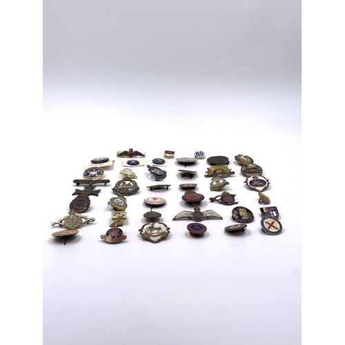 2273 - A collection of vintage badges to include RAF Bomber Squadron, Australian Commonwealth Military Forc... 