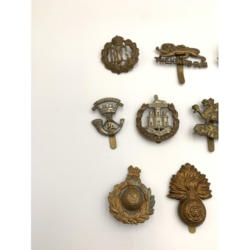 2288 - Ten military cap badges