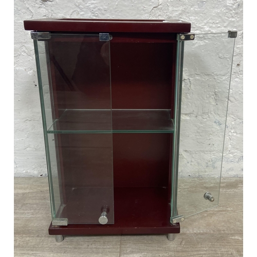 11 - A mahogany effect and glass two door jewellery cabinet - approx. 36cm high x 21.5cm wide x 13cm deep