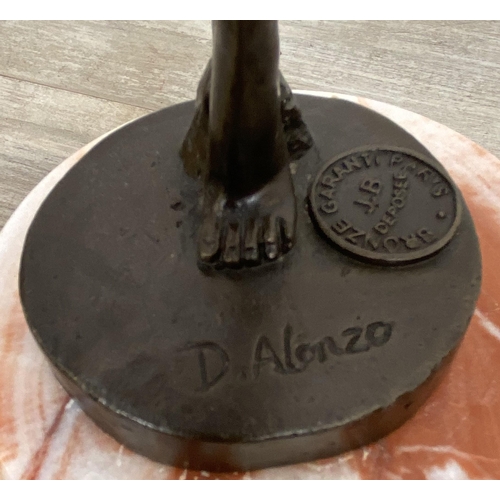 12 - An Art Deco style bronze sculpture on marble base after Dominique Alonzo, stamped 'Bronze Garanti Pa... 