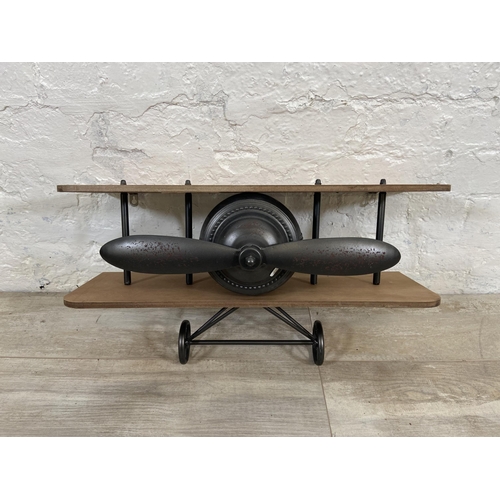 13 - A wood and metal novelty aeroplane wall shelf - approx. 31cm high x 60cm wide x 19cm deep