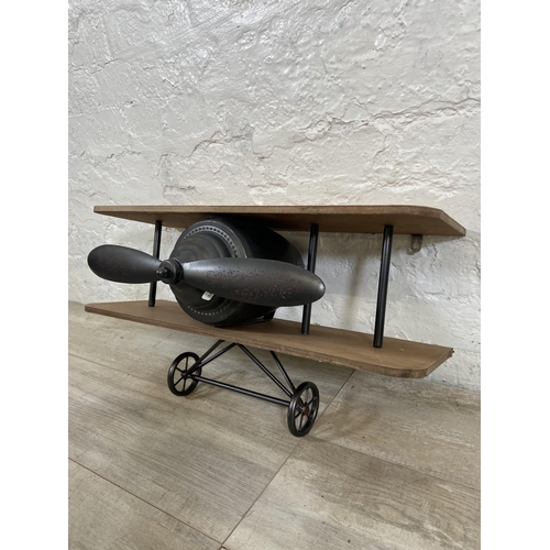 13 - A wood and metal novelty aeroplane wall shelf - approx. 31cm high x 60cm wide x 19cm deep