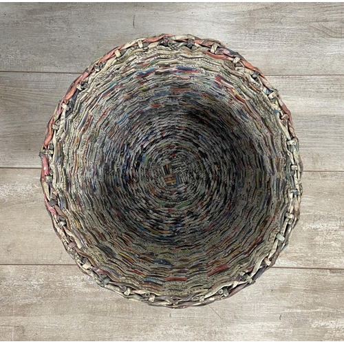 142 - Two handmade woven newspaper waste paper bins - largest approx. 33cm high x 43cm diameter