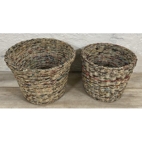 142 - Two handmade woven newspaper waste paper bins - largest approx. 33cm high x 43cm diameter