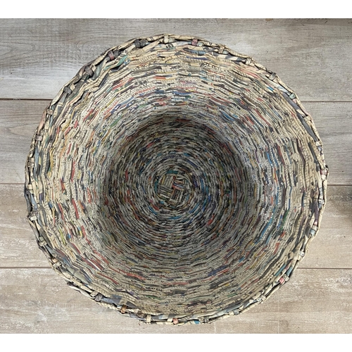 142 - Two handmade woven newspaper waste paper bins - largest approx. 33cm high x 43cm diameter