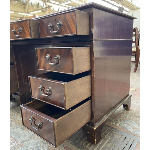 147 - A Victorian style mahogany twin pedestal desk with eight drawers and green leather insert - approx. ... 