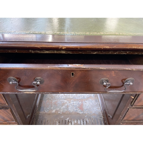 147 - A Victorian style mahogany twin pedestal desk with eight drawers and green leather insert - approx. ... 