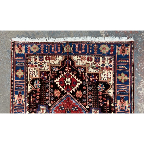 152 - A vintage Turkish machine woven rug