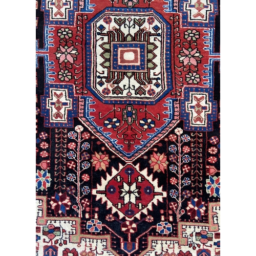 152 - A vintage Turkish machine woven rug