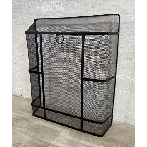 17 - A black metal meshed fireguard - approx. 71cm high x 61cm wide x 17cm deep