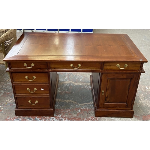 171 - A Victorian style hardwood twin pedestal desk with one cupboard door and six drawers - approx. 74.5c... 