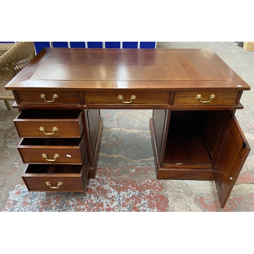 171 - A Victorian style hardwood twin pedestal desk with one cupboard door and six drawers - approx. 74.5c... 