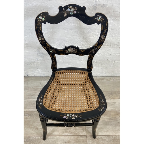 19 - A Victorian mother of pearl inlaid black lacquered and rattan occasional chair - approx. 79cm high x... 