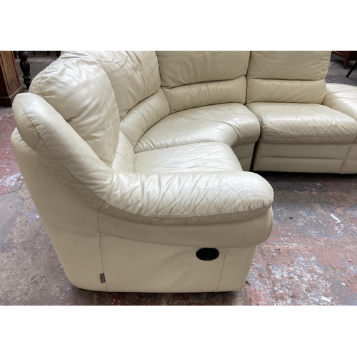 183 - A cream leather three seater corner sofa