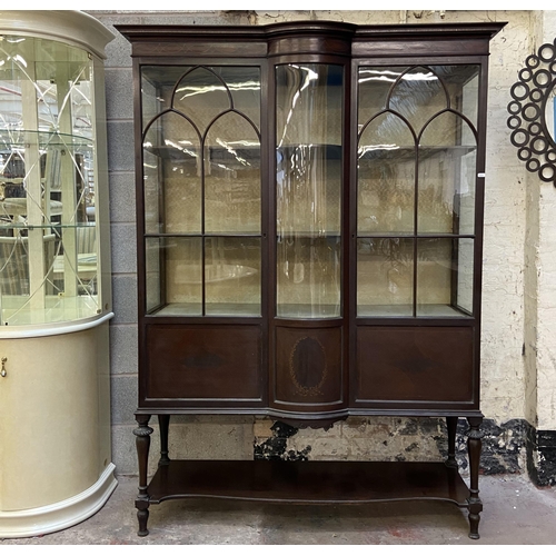 20 - An Edwardian inlaid mahogany bow fronted display cabinet - approx. 188cm high x 138cm wide x 45cm de... 