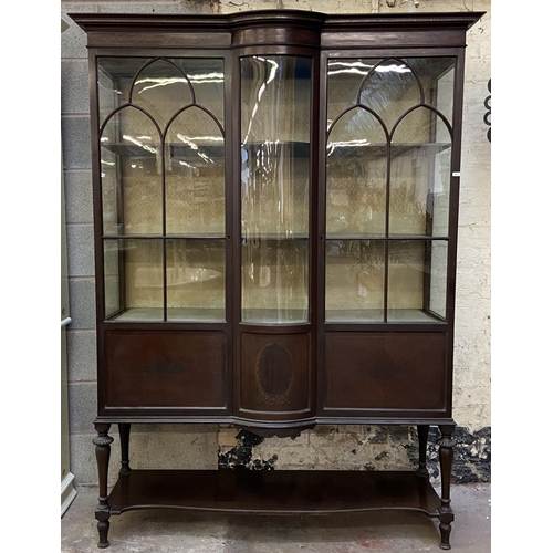 20 - An Edwardian inlaid mahogany bow fronted display cabinet - approx. 188cm high x 138cm wide x 45cm de... 