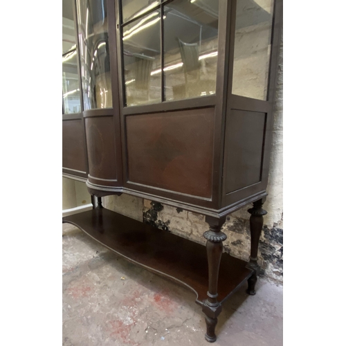 20 - An Edwardian inlaid mahogany bow fronted display cabinet - approx. 188cm high x 138cm wide x 45cm de... 