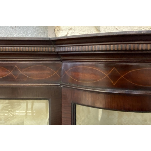 20 - An Edwardian inlaid mahogany bow fronted display cabinet - approx. 188cm high x 138cm wide x 45cm de... 