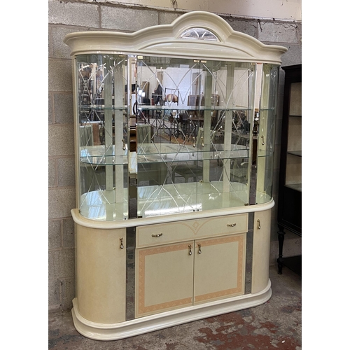 21 - An Italian Eddi Rose high gloss mirror back display cabinet - approx. 215cm high x 164 wide x 47cm d... 