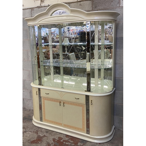 21 - An Italian Eddi Rose high gloss mirror back display cabinet - approx. 215cm high x 164 wide x 47cm d... 