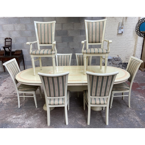 22 - An Italian Eddi Rose high gloss extending dining table and eight chairs - approx. 79cm high x 108cm ... 