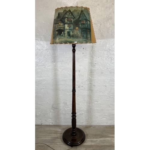 32 - A mid 20th century beech standard lamp with circular base and shade - approx. 174cm high