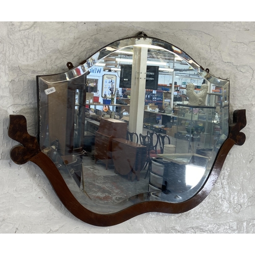 36 - Two early 20th century part walnut framed bevelled edge wall mirrors  - largest approx. 55cm high x ... 