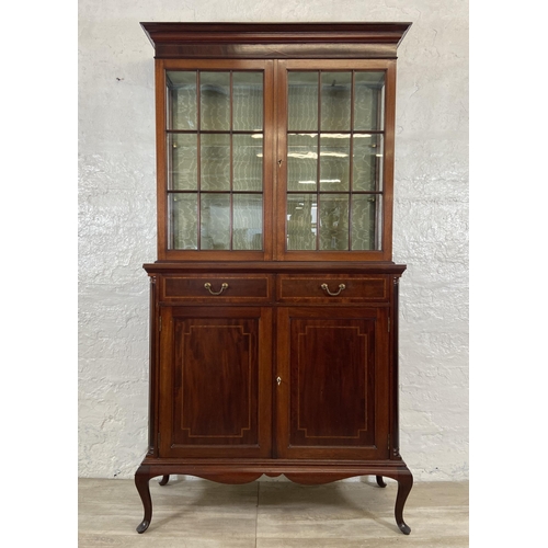 37 - An Edwardian inlaid mahogany bookcase on cabriole supports - approx. 177cm high x 91cm wide x 37cm d... 