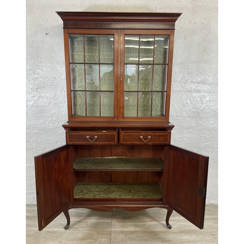 37 - An Edwardian inlaid mahogany bookcase on cabriole supports - approx. 177cm high x 91cm wide x 37cm d... 