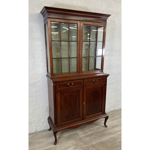 37 - An Edwardian inlaid mahogany bookcase on cabriole supports - approx. 177cm high x 91cm wide x 37cm d... 