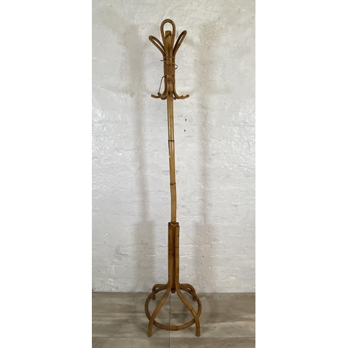 38 - A mid 20th century bamboo and wicker coat stand - approx. 176cm high