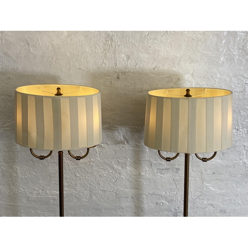 39 - A pair of B&Q Ripley 2L gilt metal two branch floor lamps - approx. 143cm high