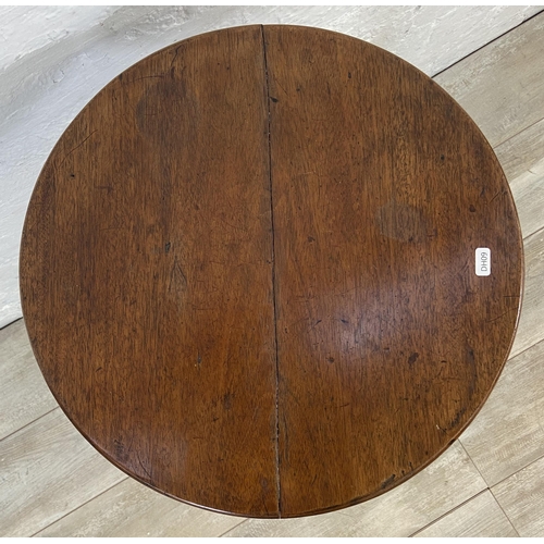 4 - A George III mahogany circular tilt top tripod pedestal side table - approx. 101cm high when tilted ... 