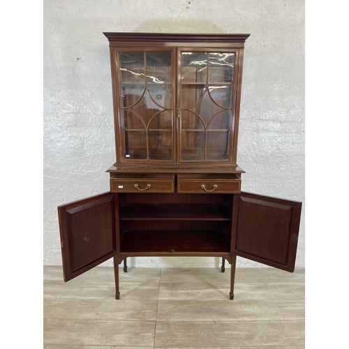 42 - An Edwardian inlaid mahogany bookcase on tapering supports - approx. 179cm high x 90cm wide x 41cm d... 