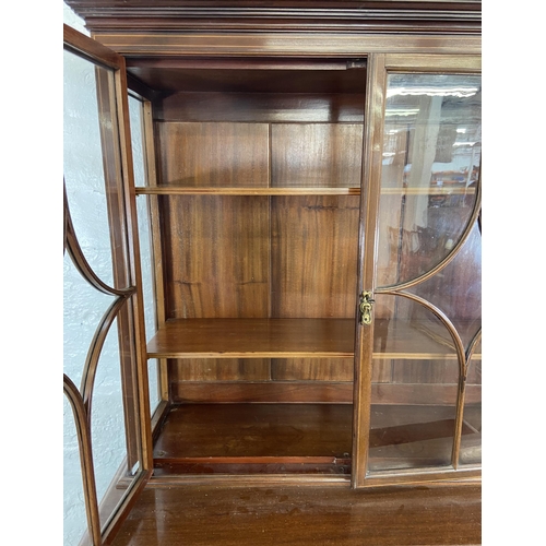 42 - An Edwardian inlaid mahogany bookcase on tapering supports - approx. 179cm high x 90cm wide x 41cm d... 