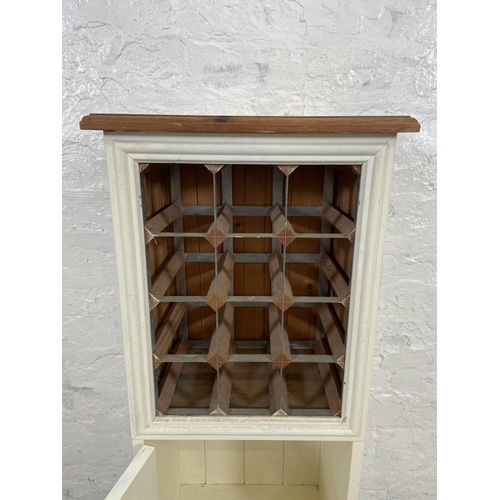 50 - A white painted pine twelve section bottle rack - approx. 90cm high x 39cm wide x 26cm deep