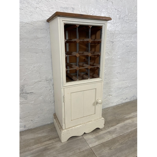 50 - A white painted pine twelve section bottle rack - approx. 90cm high x 39cm wide x 26cm deep