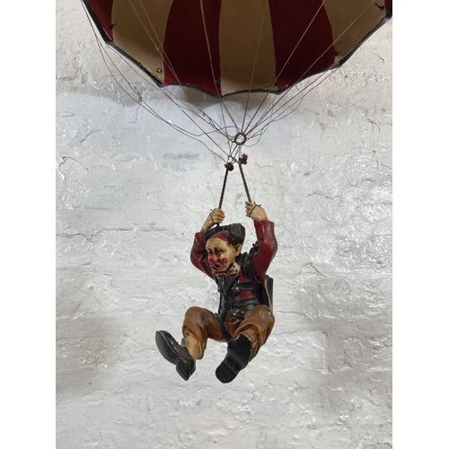 54 - A 1970s Allan Agohob hand painted plaster and resin parachute and clown hanging figurine - approx. 7... 