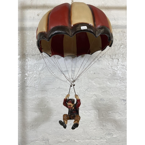 54 - A 1970s Allan Agohob hand painted plaster and resin parachute and clown hanging figurine - approx. 7... 