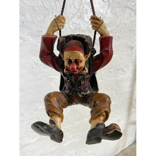 54 - A 1970s Allan Agohob hand painted plaster and resin parachute and clown hanging figurine - approx. 7... 