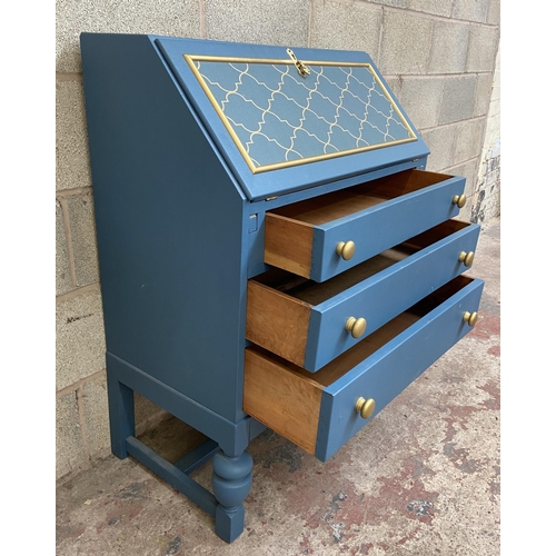 58 - An early/mid 20th century blue and gold painted bureau - approx. 102cm high x 76cm wide x 44cm deep