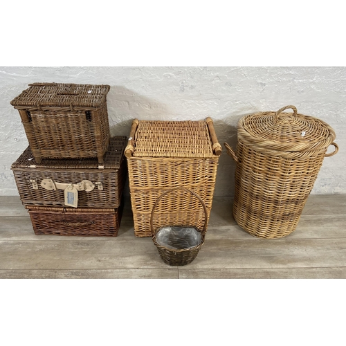 61 - Seven wicker baskets