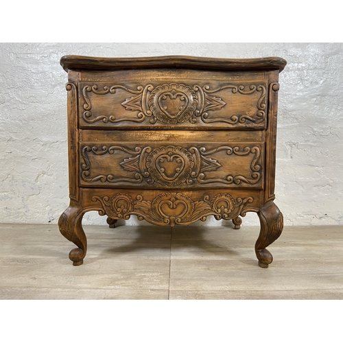 7 - A French Louis XV style carved walnut chest of drawers on cabriole supports - approx. 67cm high x 71... 