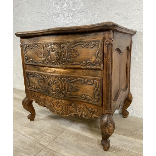 7 - A French Louis XV style carved walnut chest of drawers on cabriole supports - approx. 67cm high x 71... 